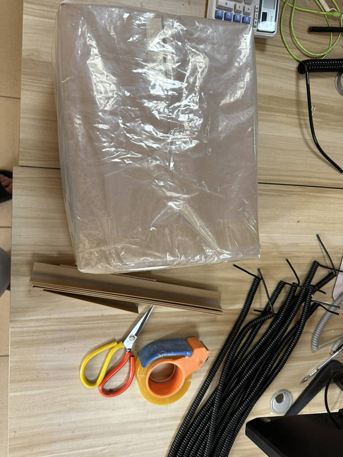 Custom coiled cables at the packing workstation