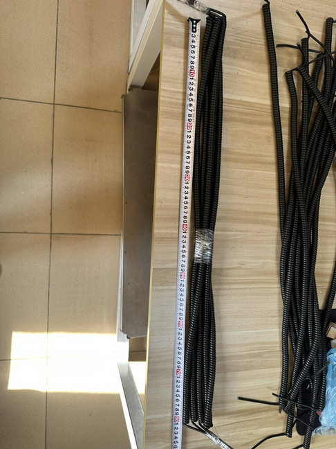 Relaxed length inspection for a custom coiled cable batch